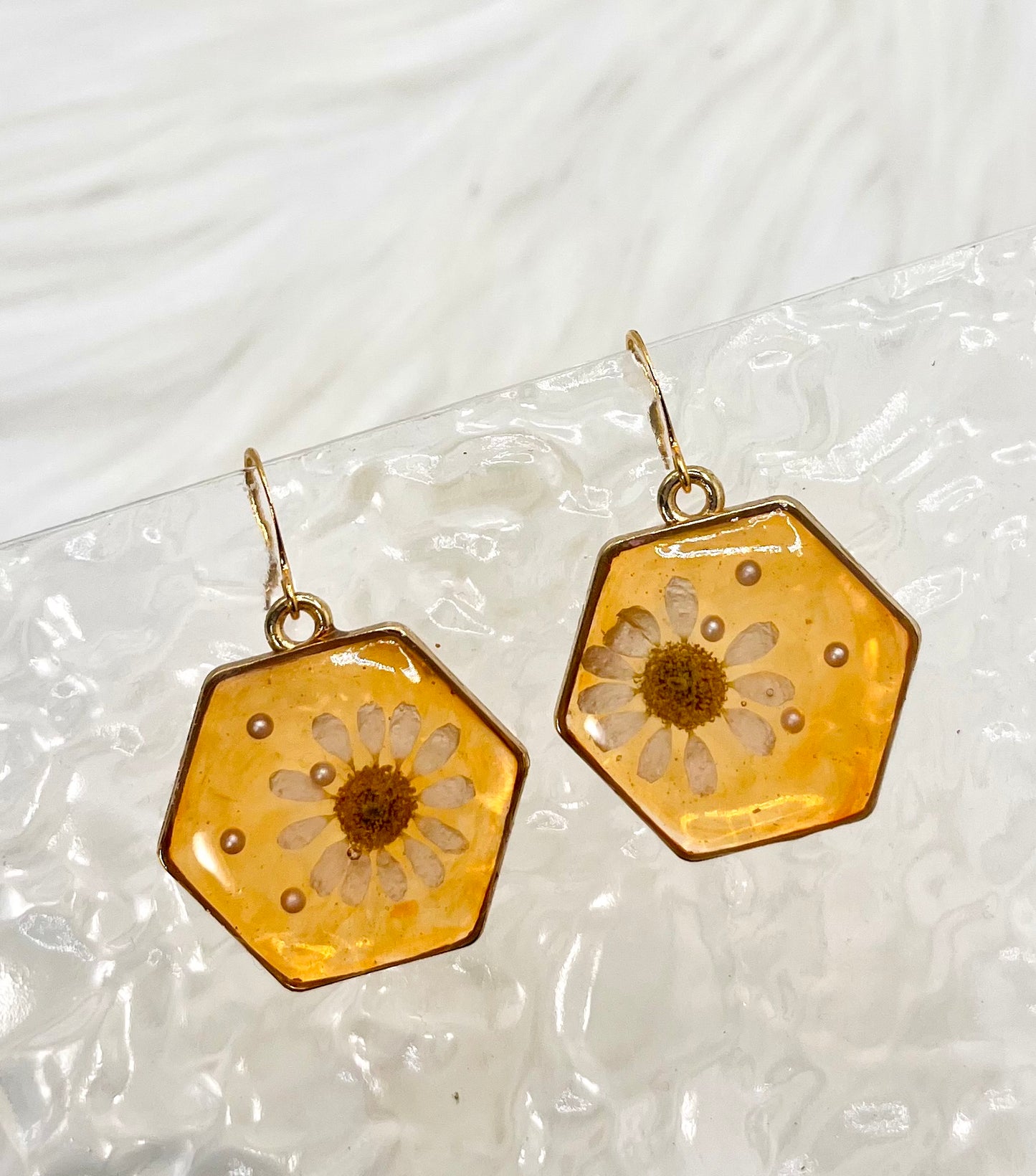 HEXAGON ORANGE FLORAL DANGLES