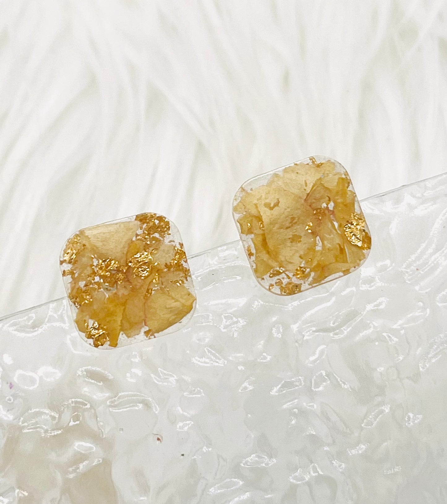 PALE ORANGE FLORAL STUDS
